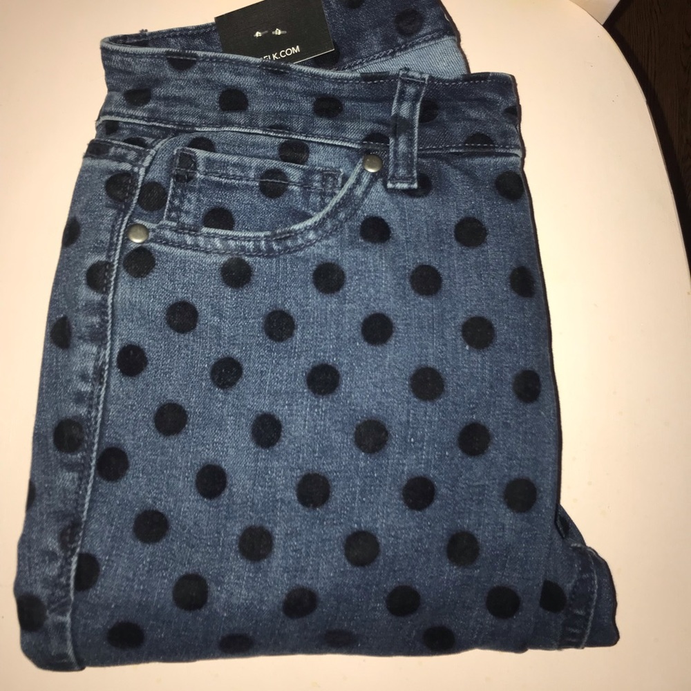 Super cute jeans with black polka dots